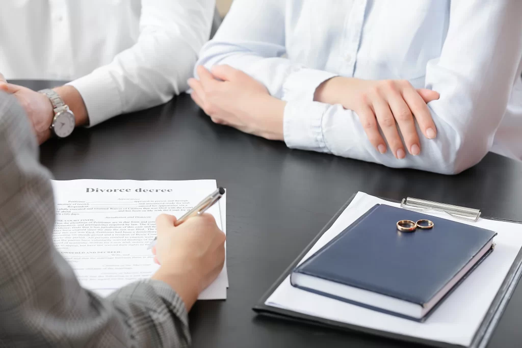 Divorcing couple meeting with a divorce mediator at WhitsonLaw PLLC in Upstate New York